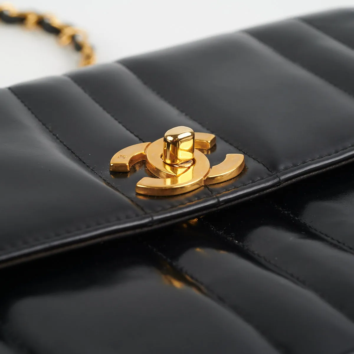 Chanel Vintage Vertical Half Flap Black Shiny Leather
