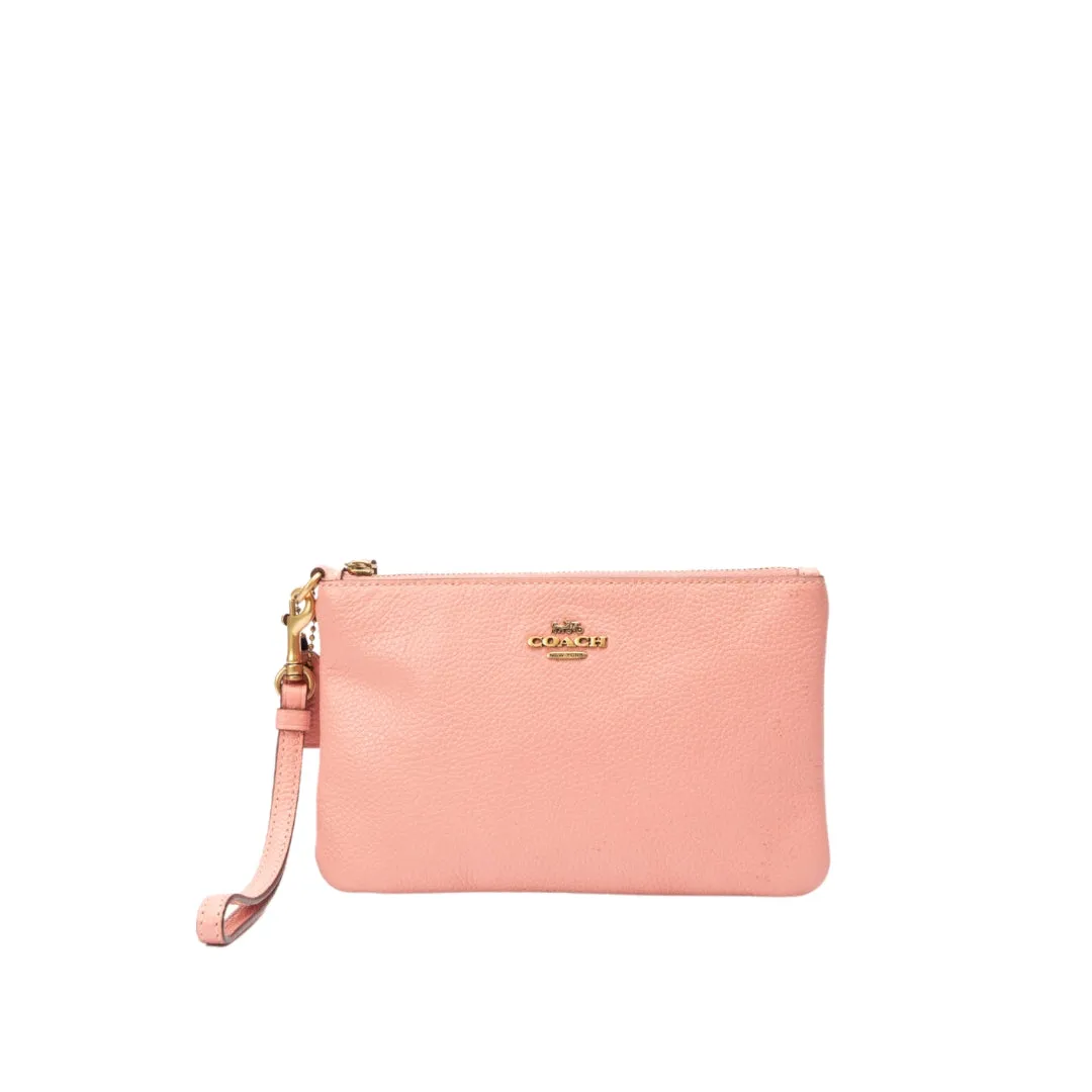 Coach Pink Medium Wristlet flash sale luggage