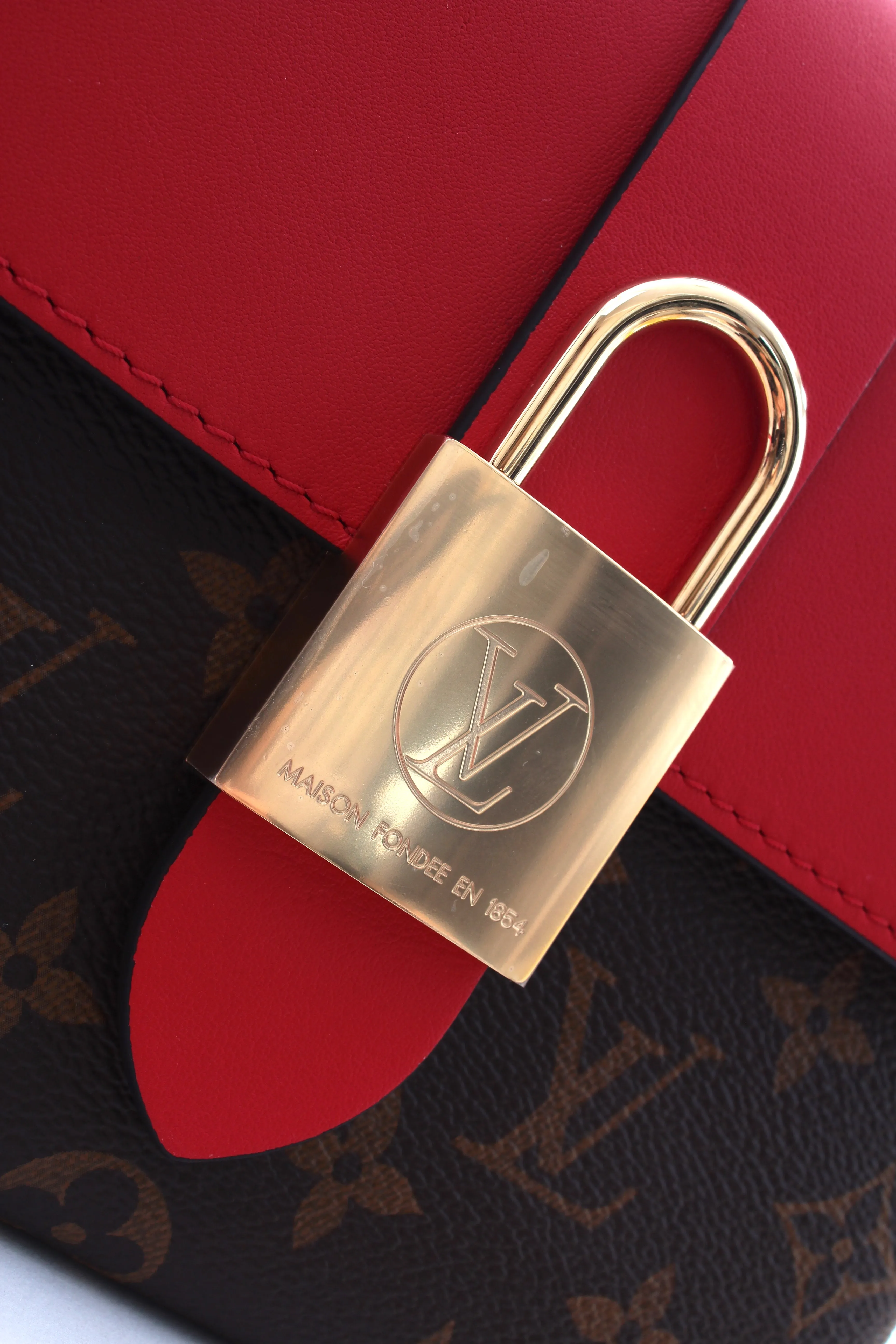 Louis Vuitton Locky BB Monogram Canvas and Leather Bag - Current Season