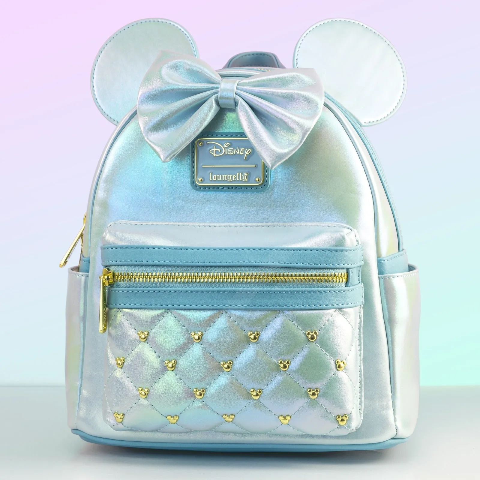 Loungefly x Disney Minnie Mouse Pearlescent Sky Quilted Mini luxury backpacks at outlet prices