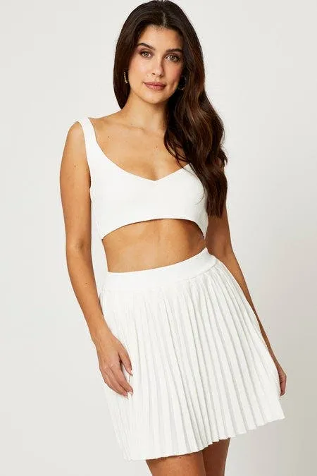White Knit Skirt Bralette Set,skirt,denim skirt,mini skirt,maxi skirt,jean skirt,skort,tennis skirt,pleated skirt,pencil skirt,bubble skirt,plisse skirt,fitted skirt,midi skirt,short skirt,short mini skirt,leather skirt,a line skirt