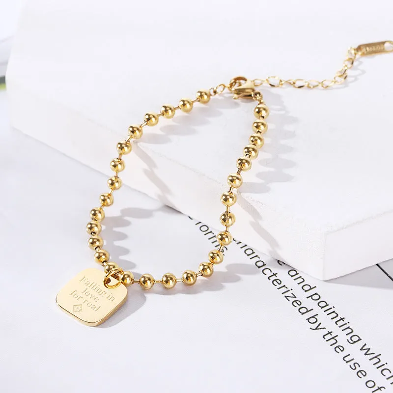 Wholesale 18K gold-plated titanium steel trendy simple geometric tag round bead chain bracelet