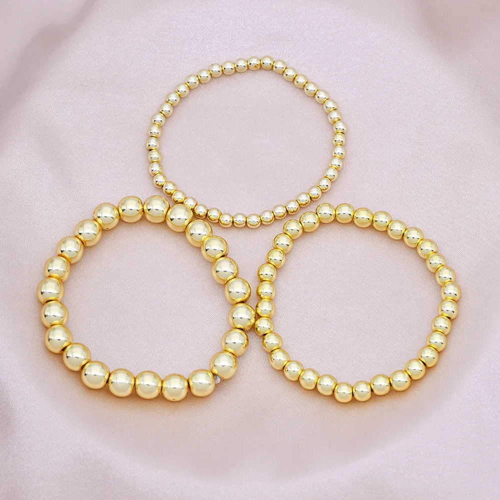 Wholesale beaded gold bracelet men's and women's color-retaining gold-plated elastic multi-layer stacked round bead bracelet bracelet