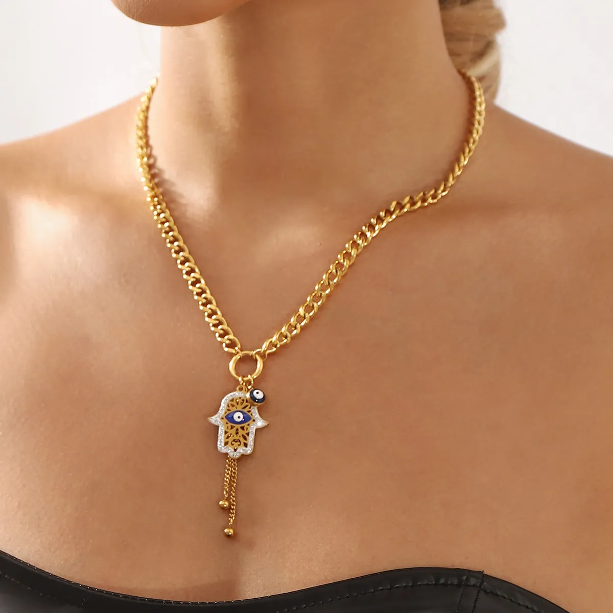 Wholesale Evil Eye Palm Moon Tassel Rhinestone Titanium Steel Necklace light_wish_jewels