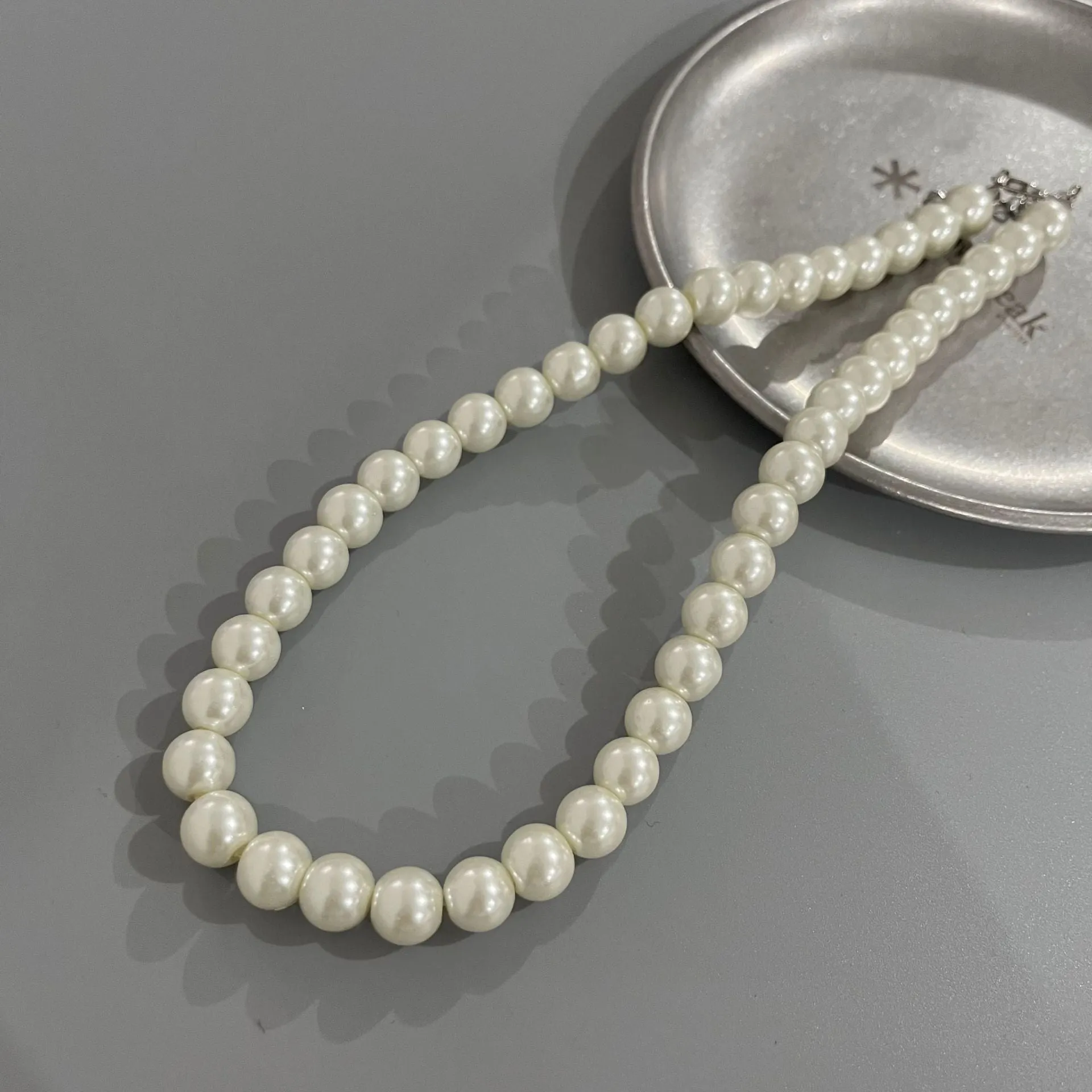 Wholesale Rice Bead Titanium Steel Necklace Hollow Heart Pendant Sweater Chain