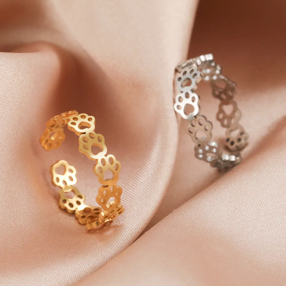 Wholesale Titanium steel color hollow continuous cat footprint opening adjustable couple ring stainless steel opening ring
